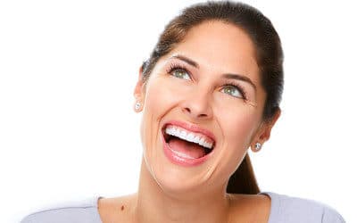 Lady showing her white teeth after teeth whitening